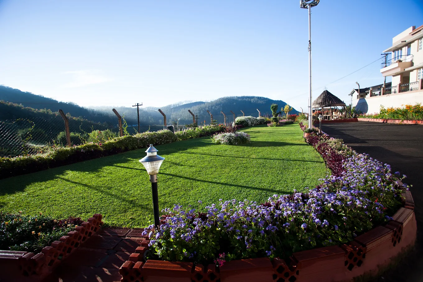 Garden and sit-out area at Delightz Inn, Ooty