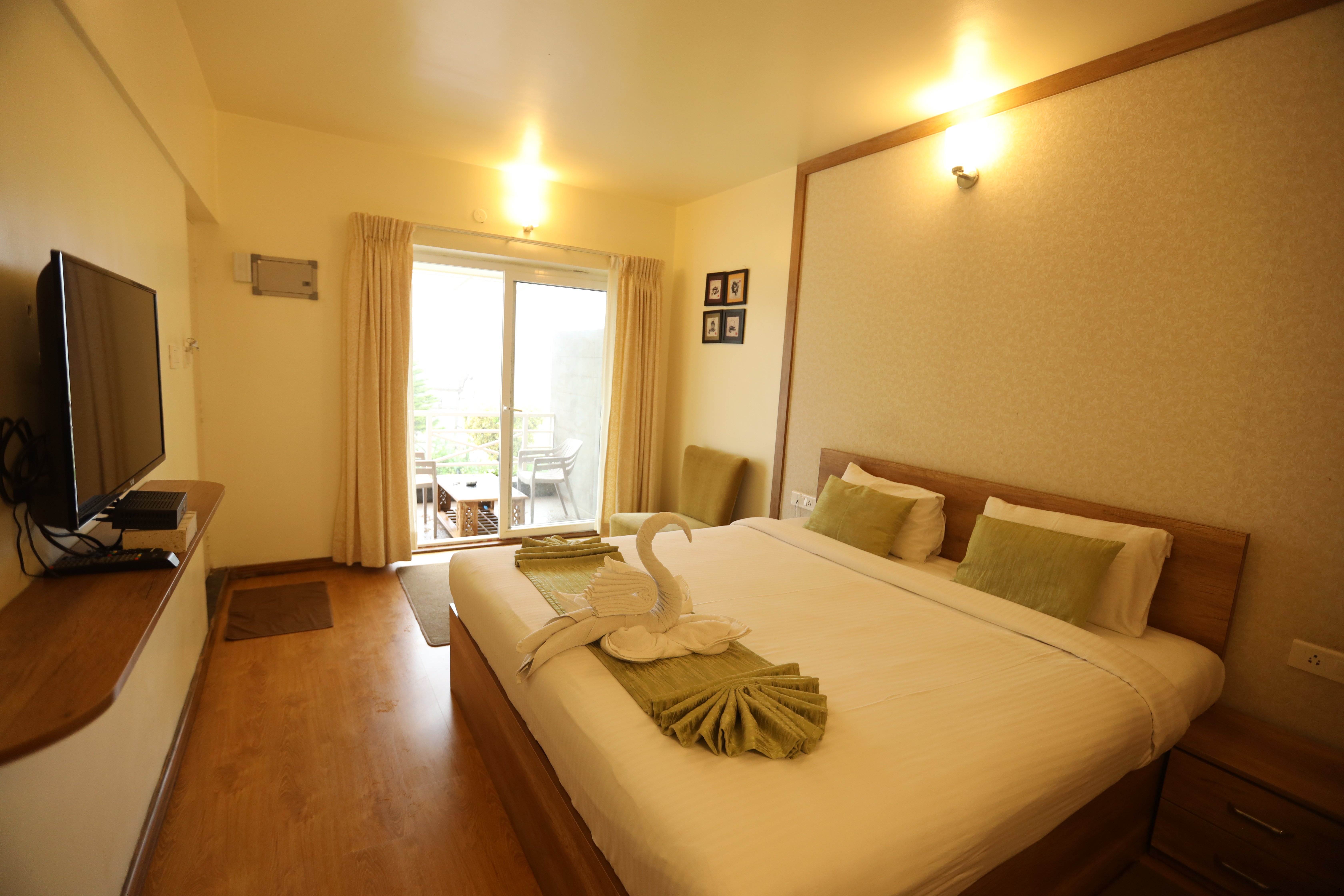 Studio room garden view with balcony at Delightz Inn, Ooty