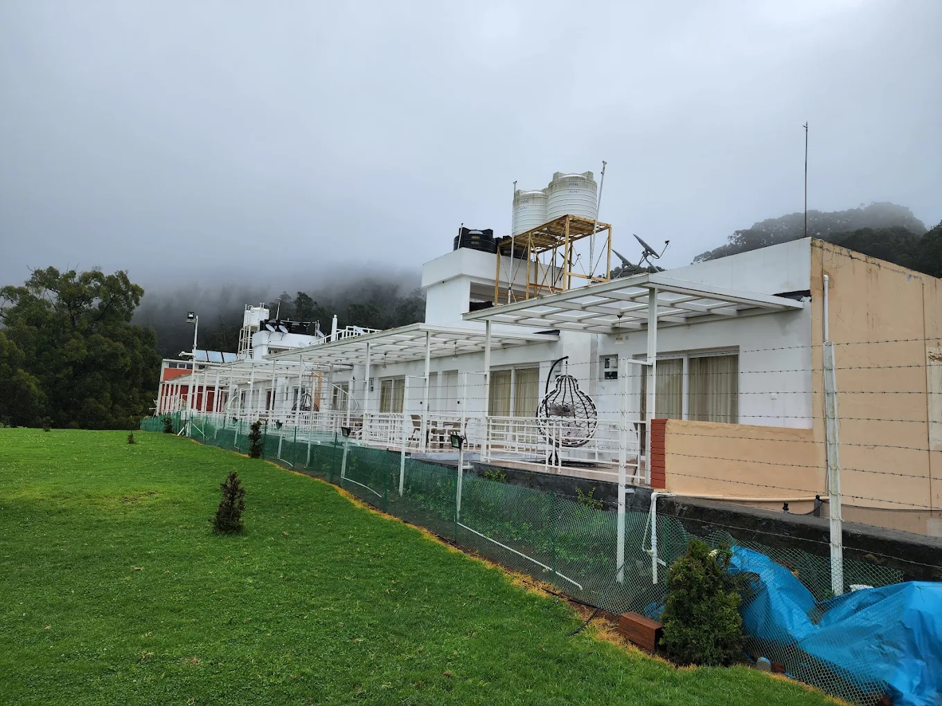 Garden and sit-out area at Delightz Inn, Ooty