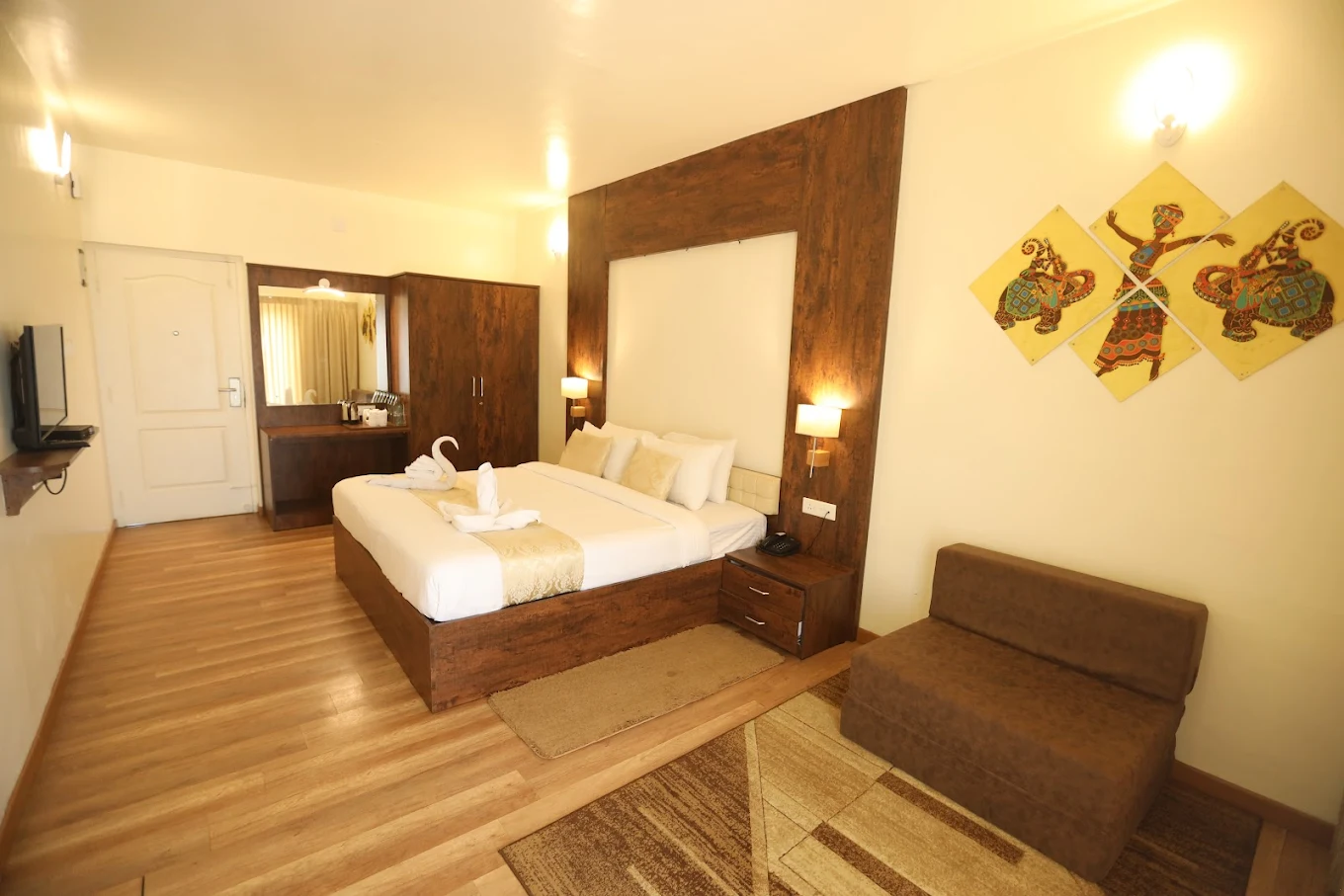 Suite-style room with seating at Delightz Inn, Ooty