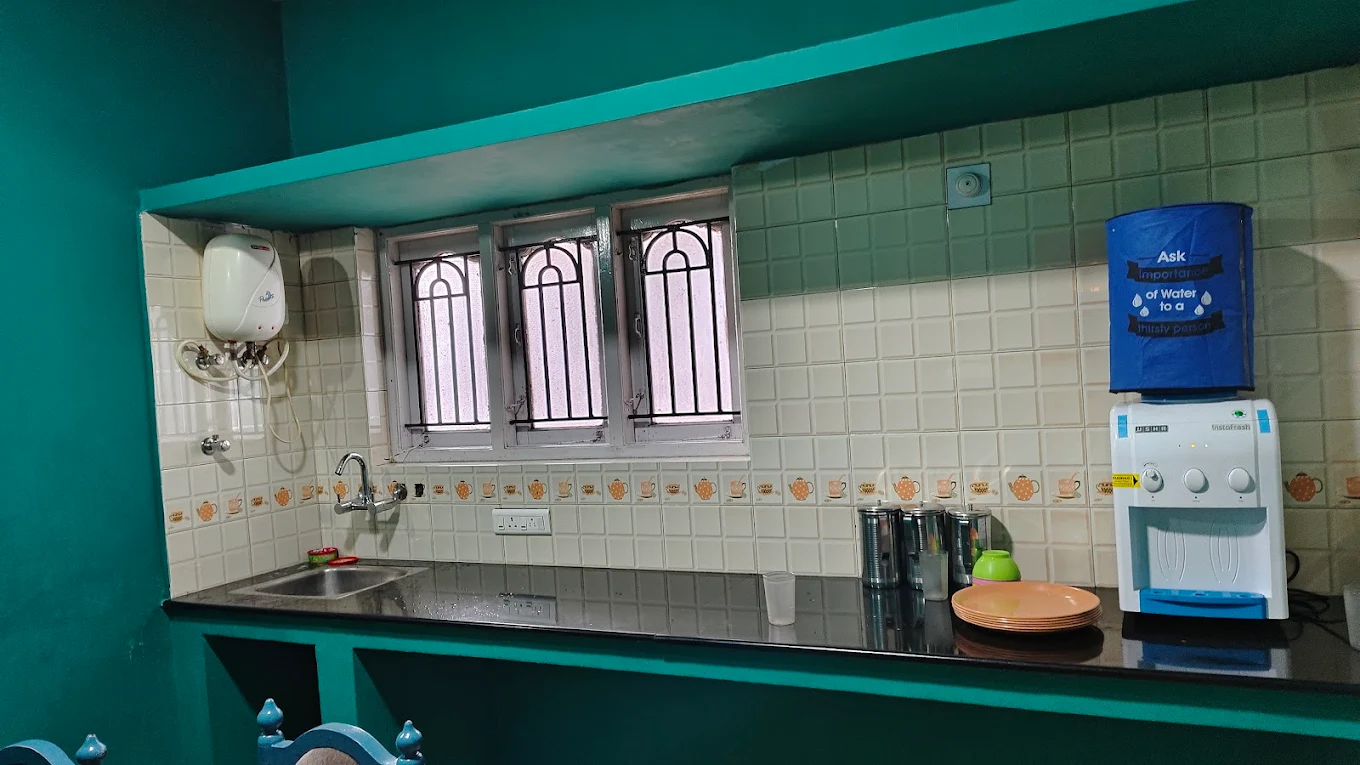 Dining or kitchen area at Ganga Sri Balaji Cottage, Ooty