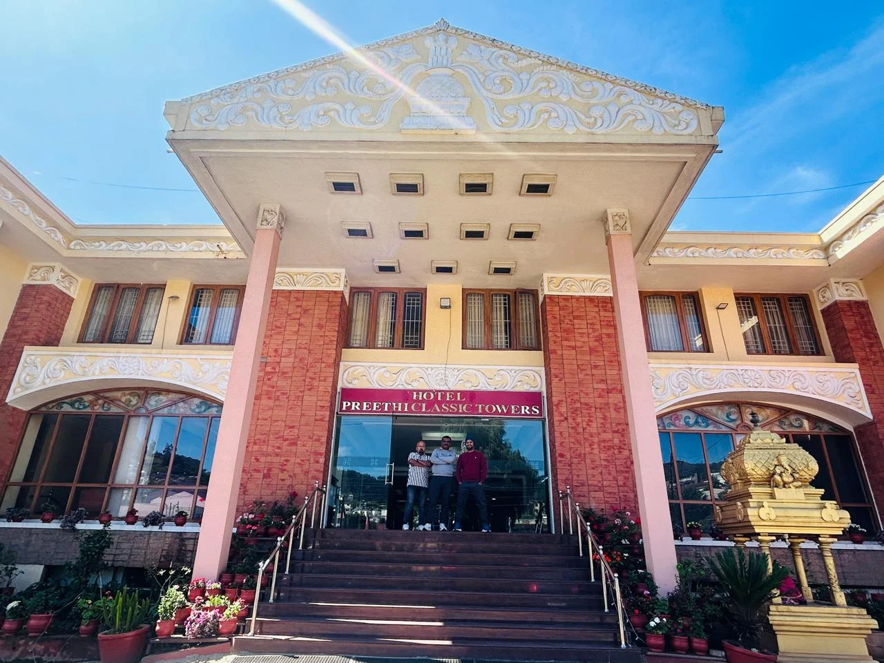 Hotel Preethi Classic Towers illuminated at night