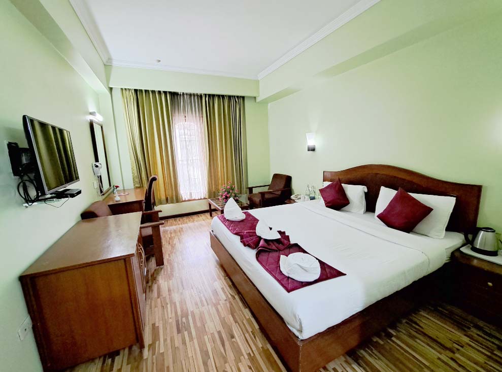 Super Deluxe room at Hotel Preethi Classic Towers in Ooty
