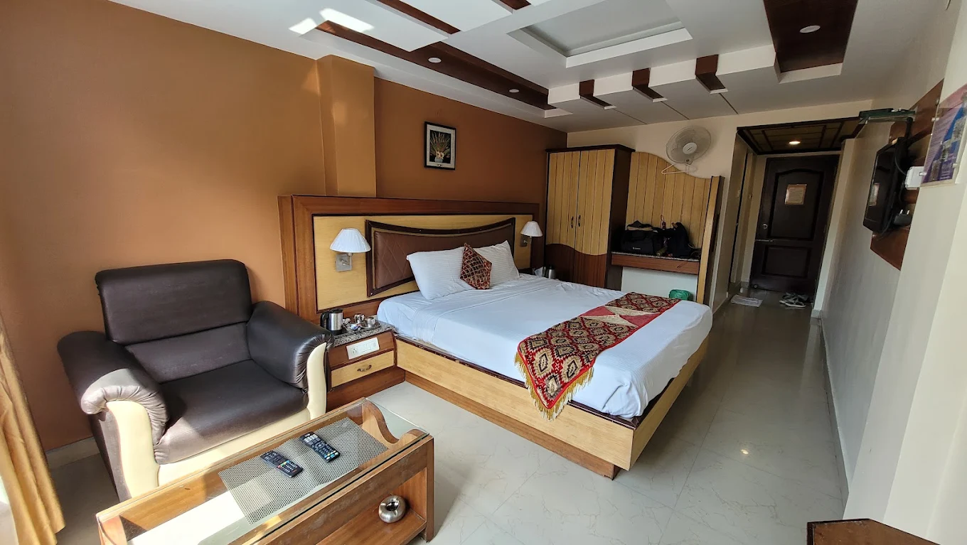 Suite-style room interior at Ponmari Residencyy, Ooty