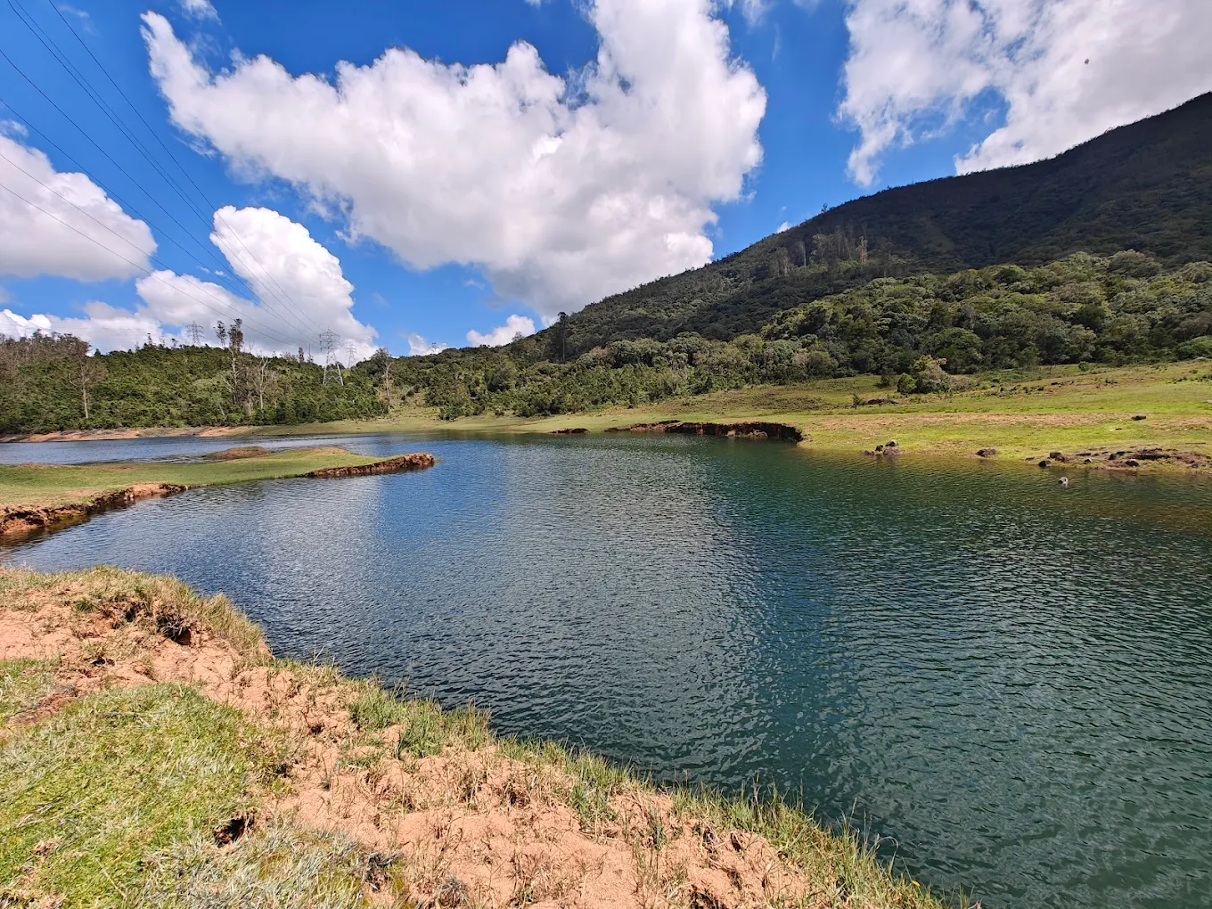 Emerald Lake View Point near Ooty with blue lake and surrounding tea estates from the upper viewpoint