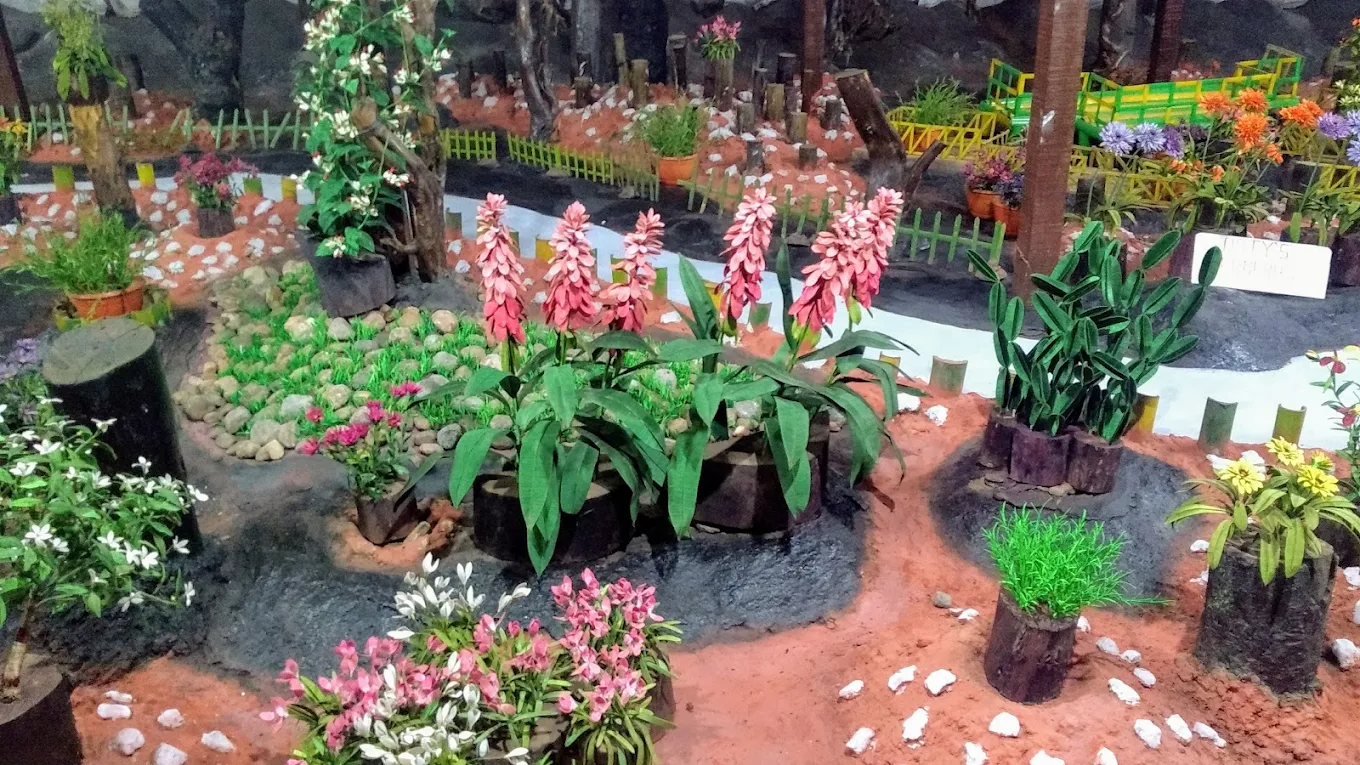 Indoor artificial flower displays at Thread Garden opposite Ooty Boat House